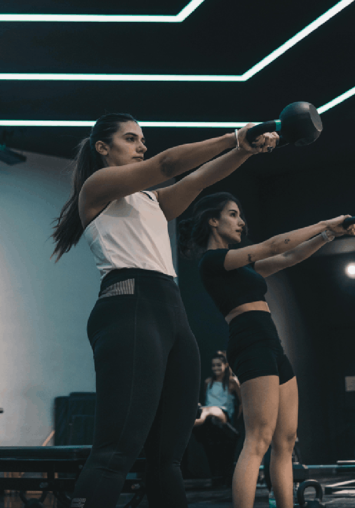 woman-doing-exercise-on-a-machine-in-a-gym